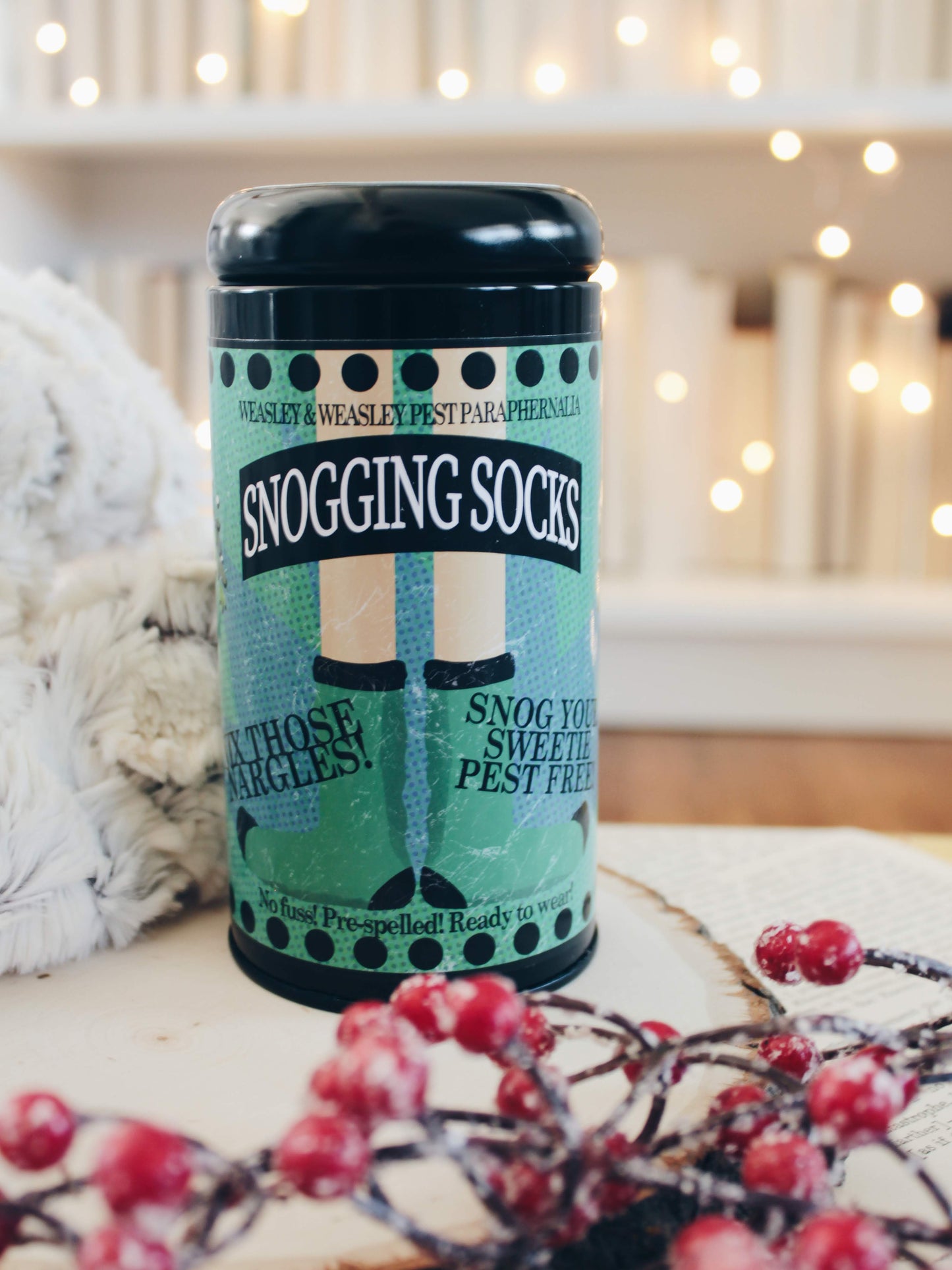 Mistletoe with nargles on green and black socks from weasley's wizard wheezes