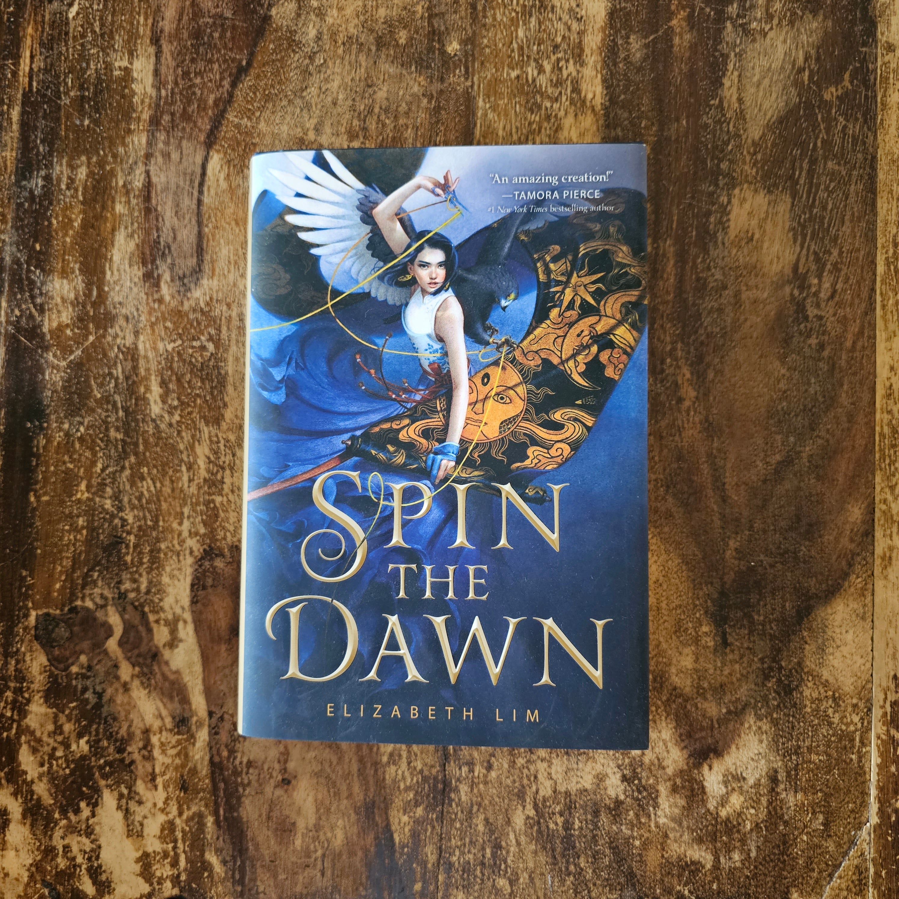 Spin the Dawn (Owlcrate) – Dust and Pages