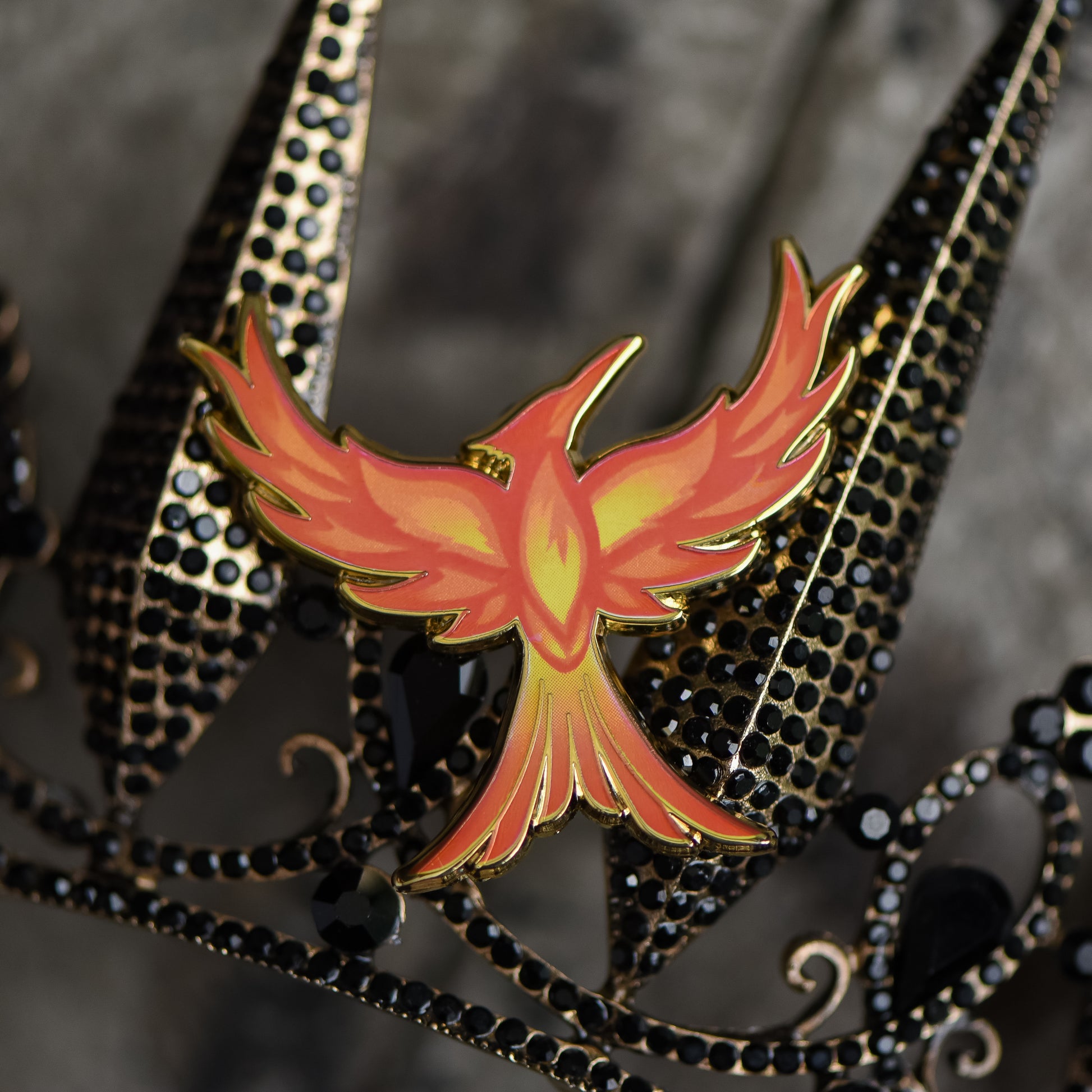 Mockingjay with red orange and yellow flame details enamel pin