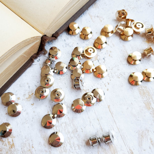 Silver and gold locking pin backs for enamel pins