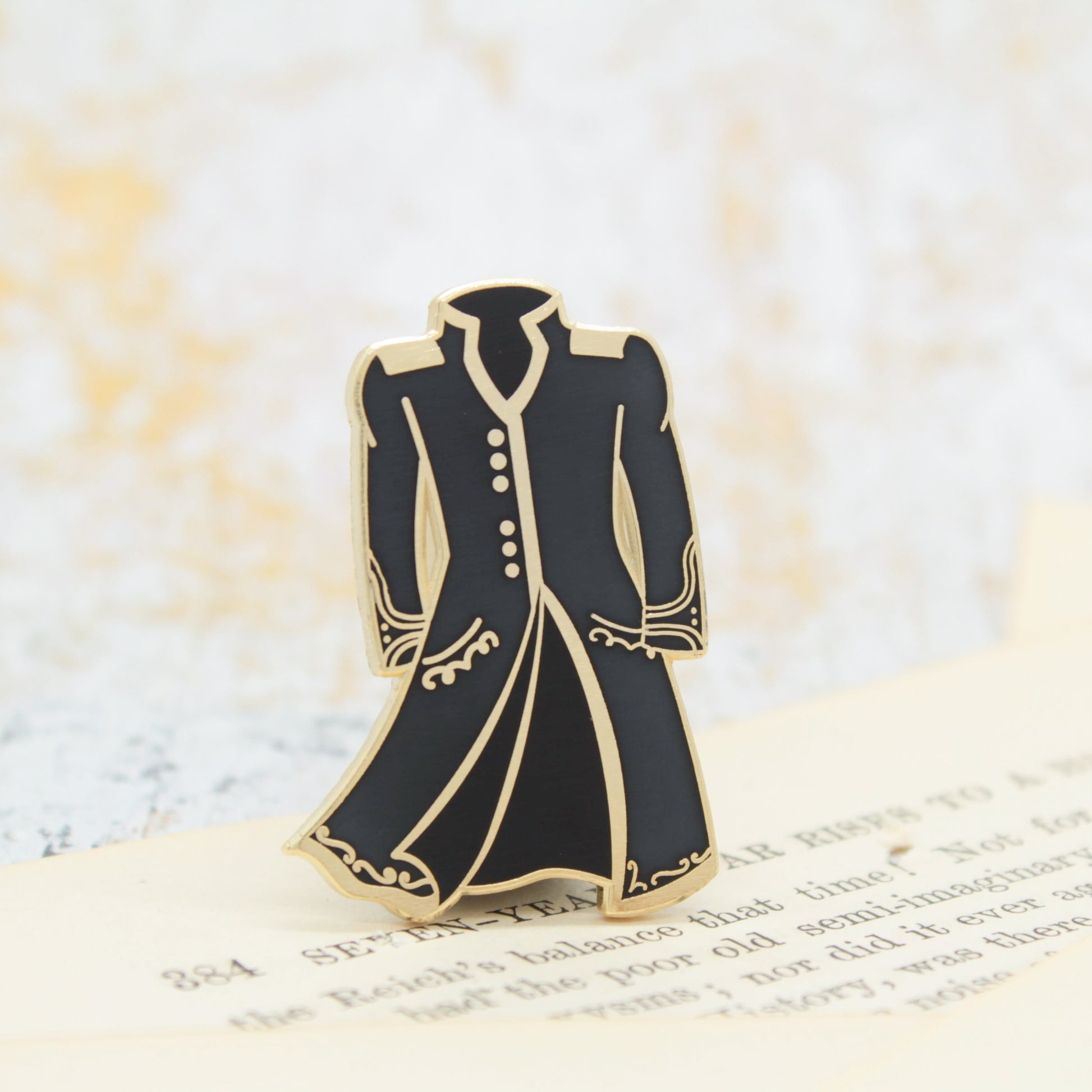 Color changing magic coat a darker shade of magic red to black enamel pin