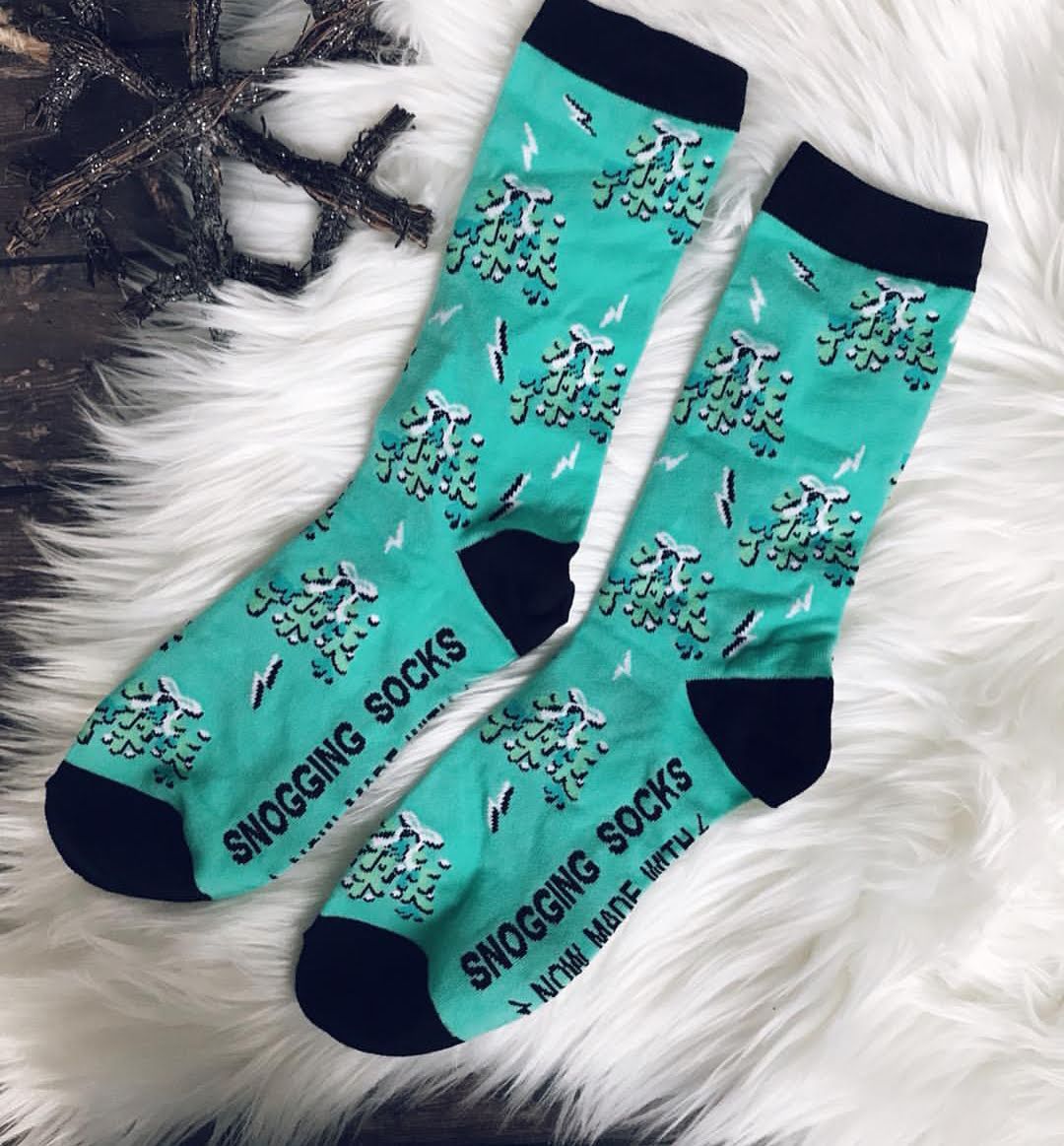 Mistletoe with nargles on green and black socks from weasley's wizard wheezes