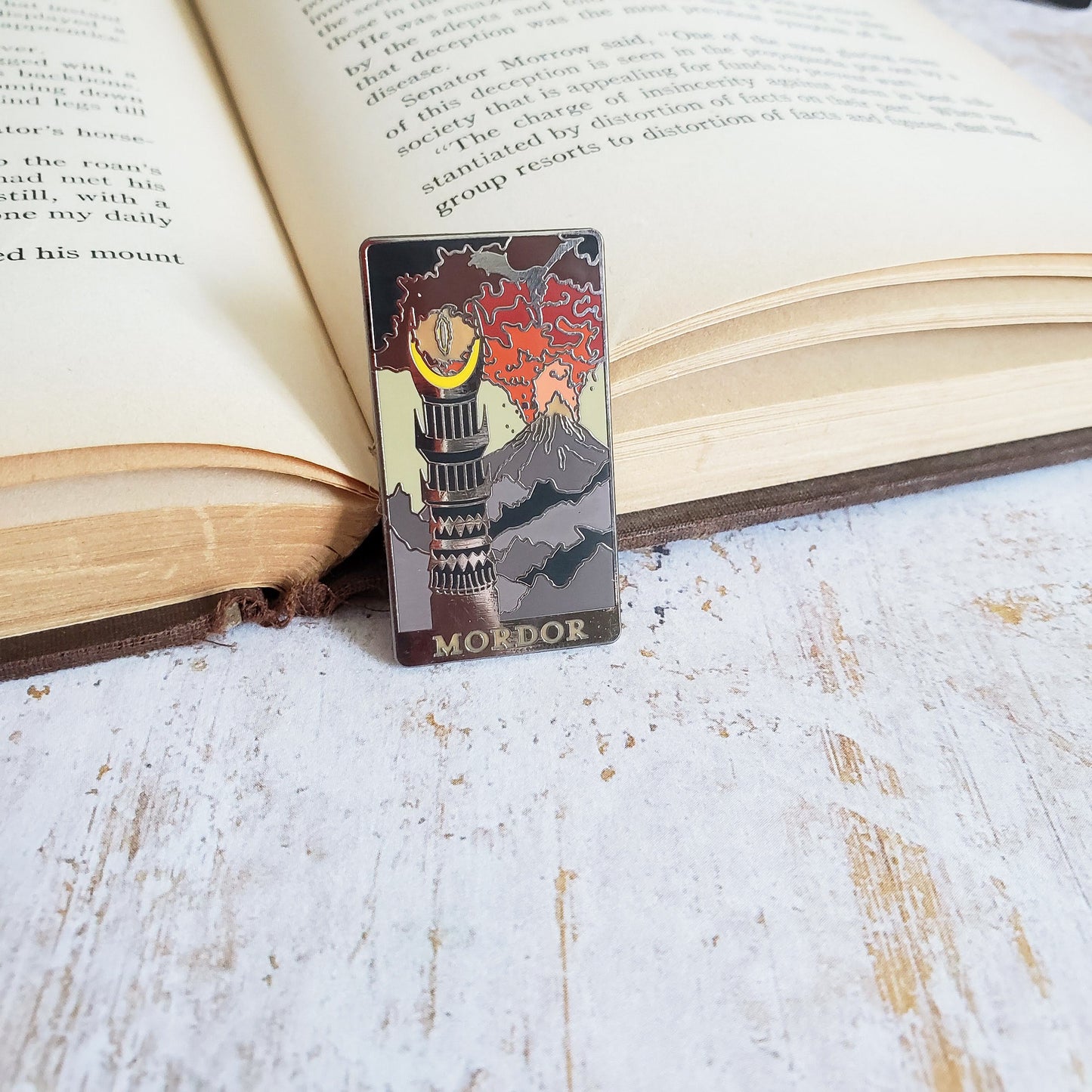 Literary landscapes Eye of Mordor ring wraith mountain of doom color changing enamel pin