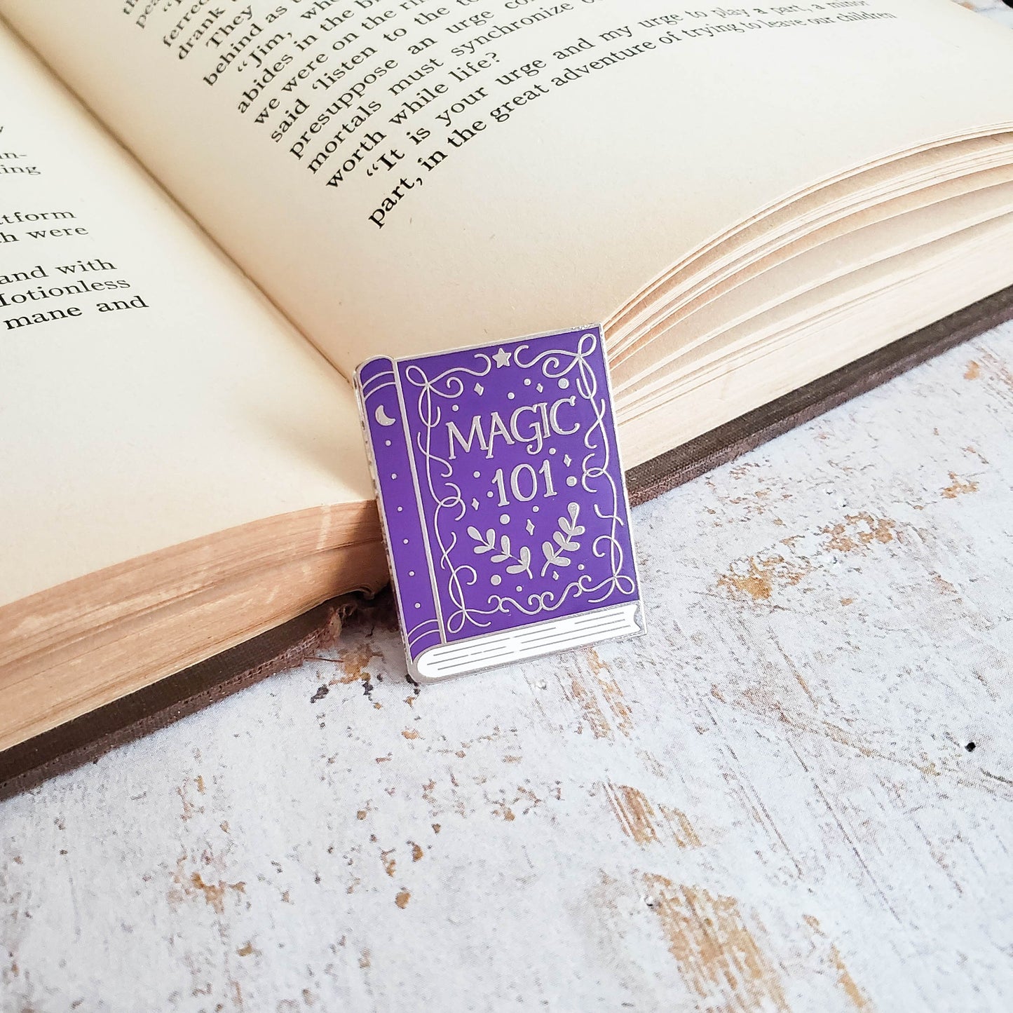 Wizardry and witchcraft purple magic spellbook enamel pin