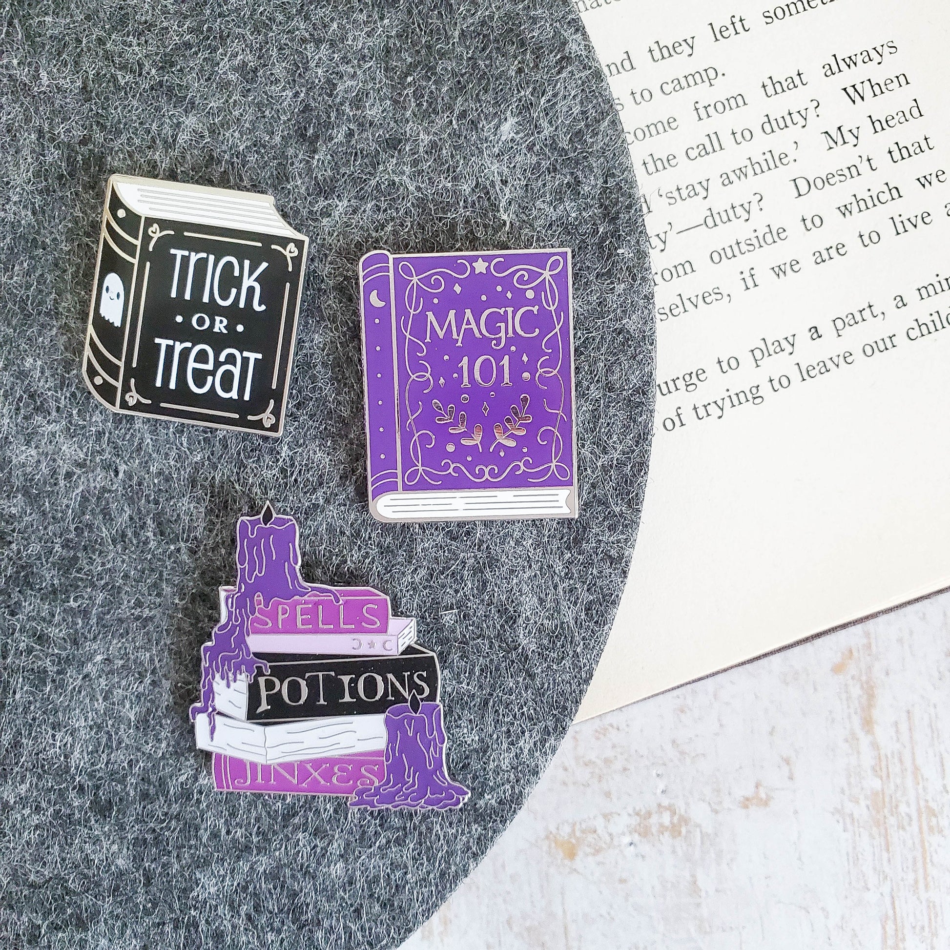 Set of purple halloween spellbooks magic jinxes and potion enamel pin
