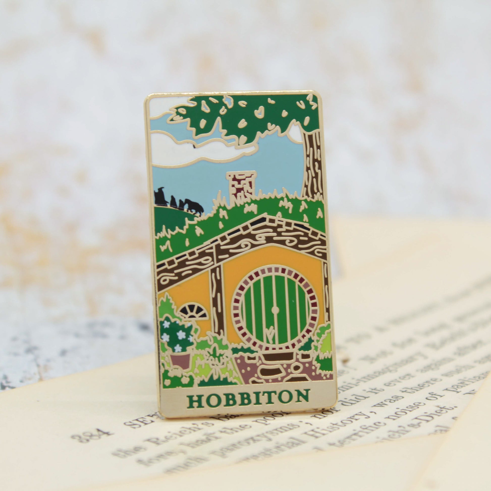 Hobbit hole green door fellowship adventure gold enamel pin